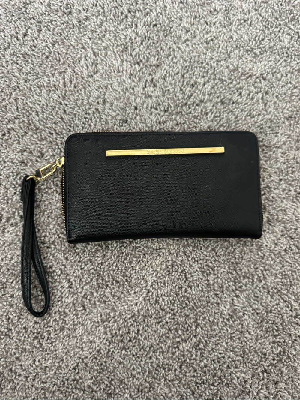 Steve Madden Black Wristlet with Gold Bar Detail